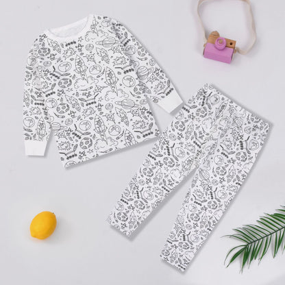 Child wearing colorable bamboo pajamas with Universe design
